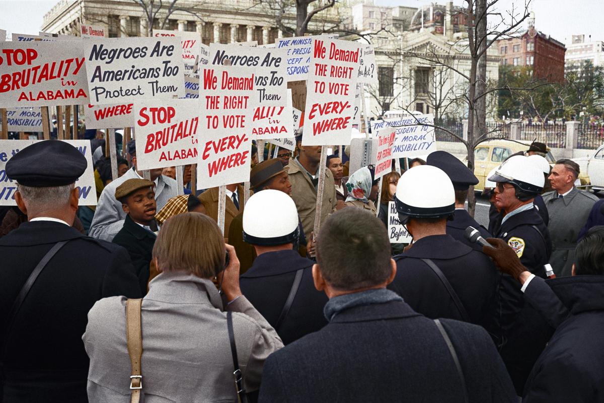 A collage of historical images showing labor unions, suffragettes, and civil rights activists united in solidarity